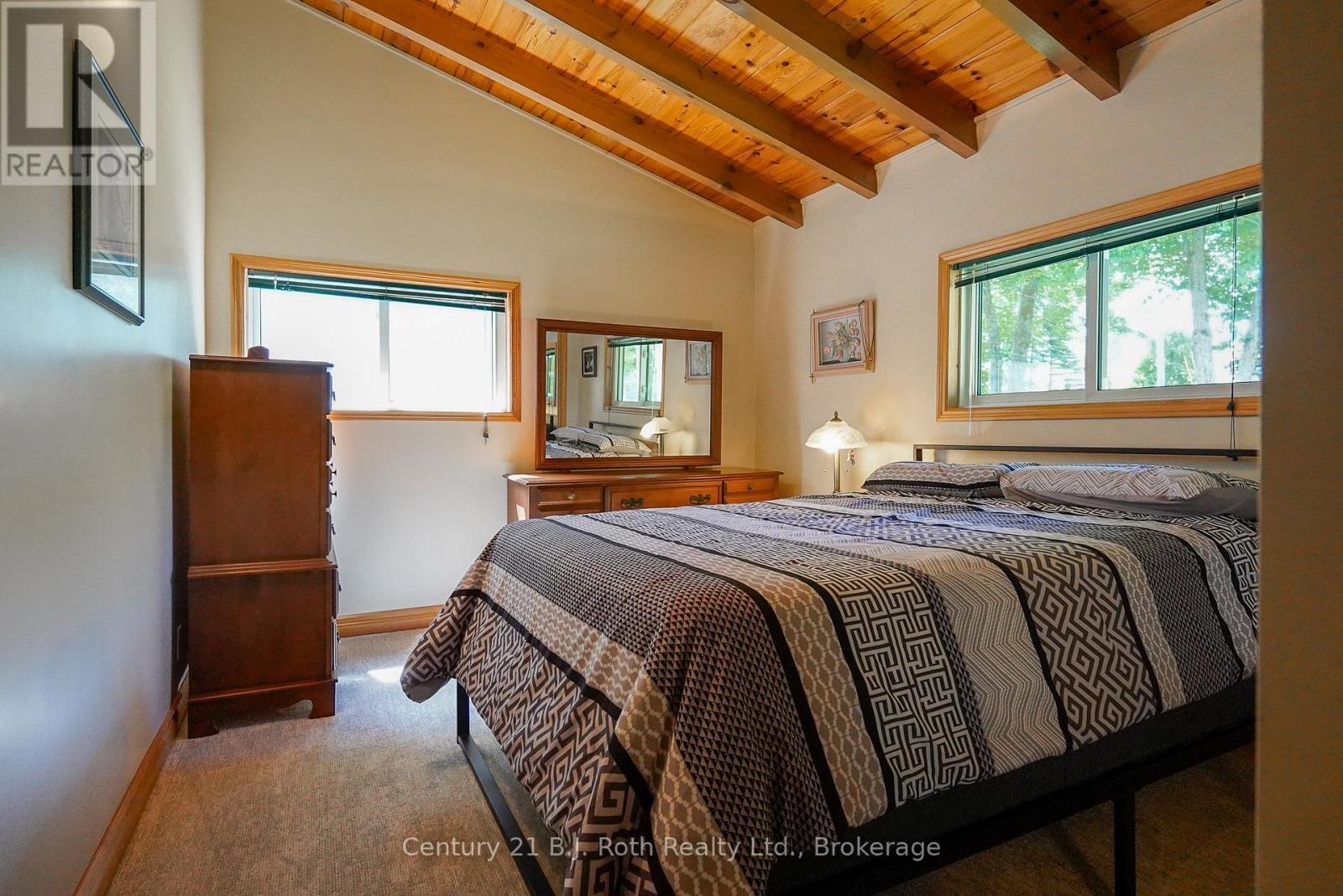 169 Odd'S Drive, Parry Sound Remote Area (Restoule), ON - Indoor Photo Showing Bedroom