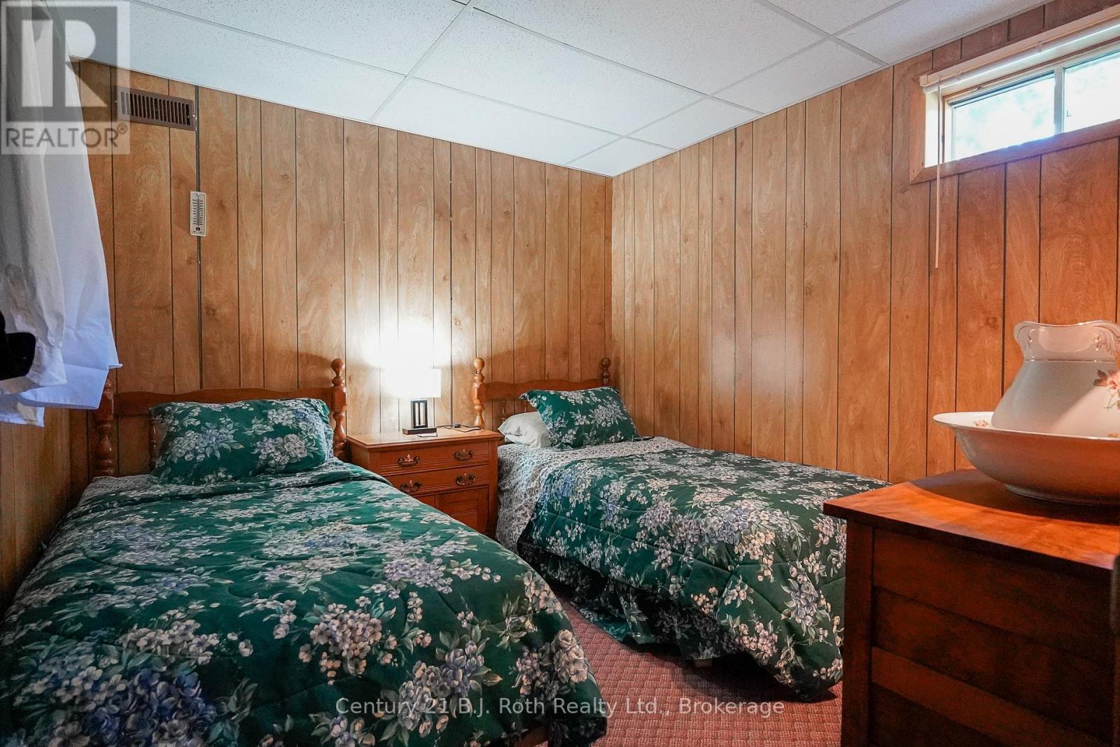 169 Odd'S Drive, Parry Sound Remote Area (Restoule), ON - Indoor Photo Showing Bedroom