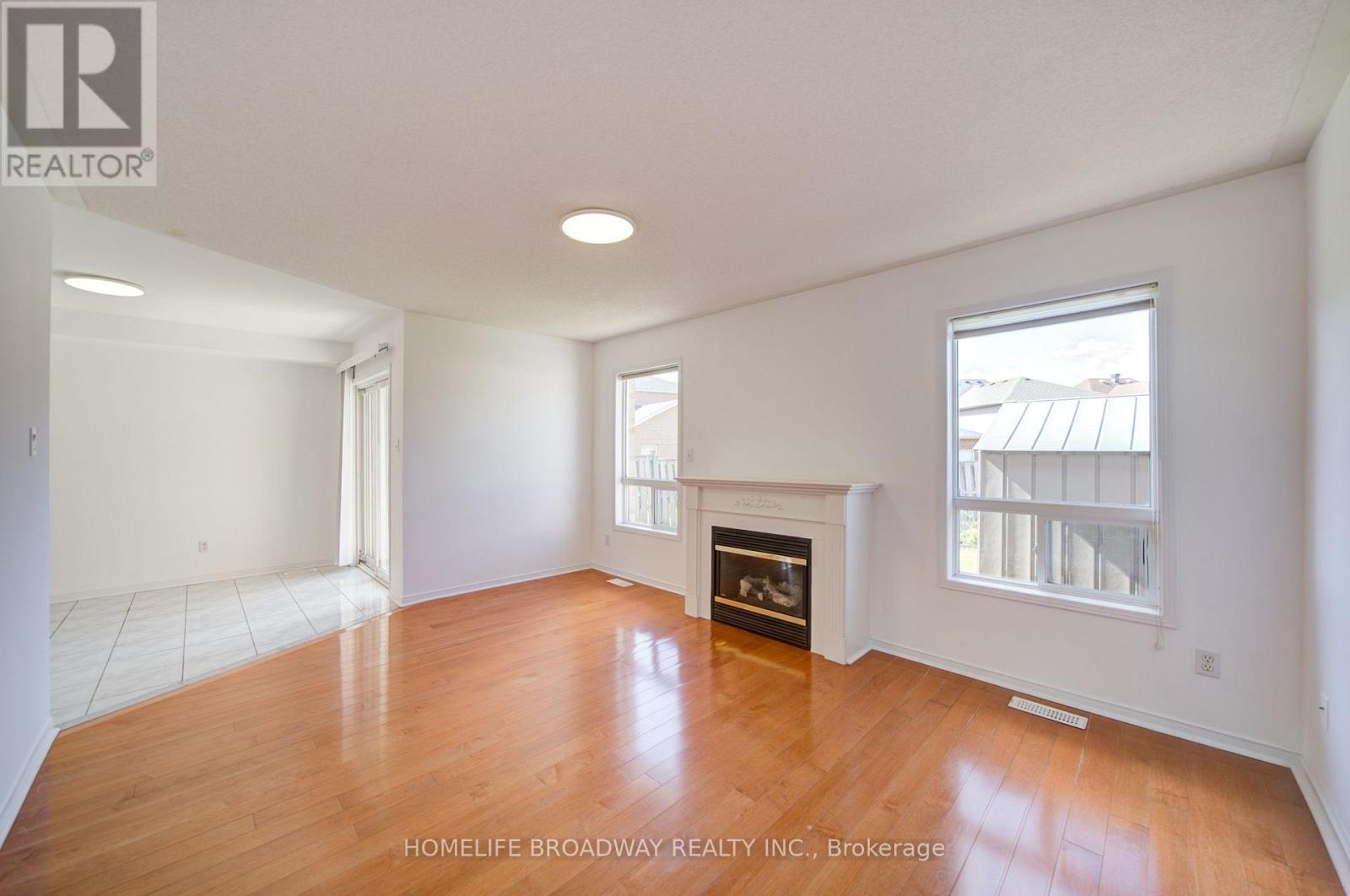 16 Raymond Bartlett Avenue, Markham, ON - Indoor Photo Showing Other Room With Fireplace