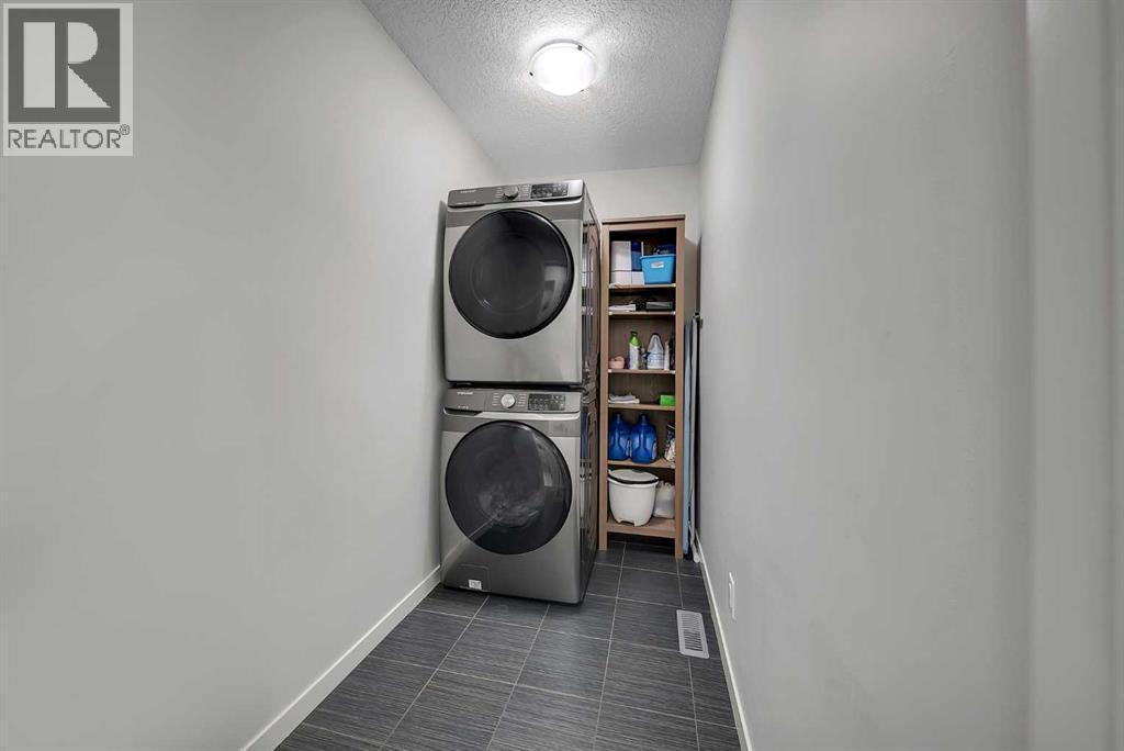 132 Howse Crescent Ne, Calgary, AB - Indoor Photo Showing Laundry Room