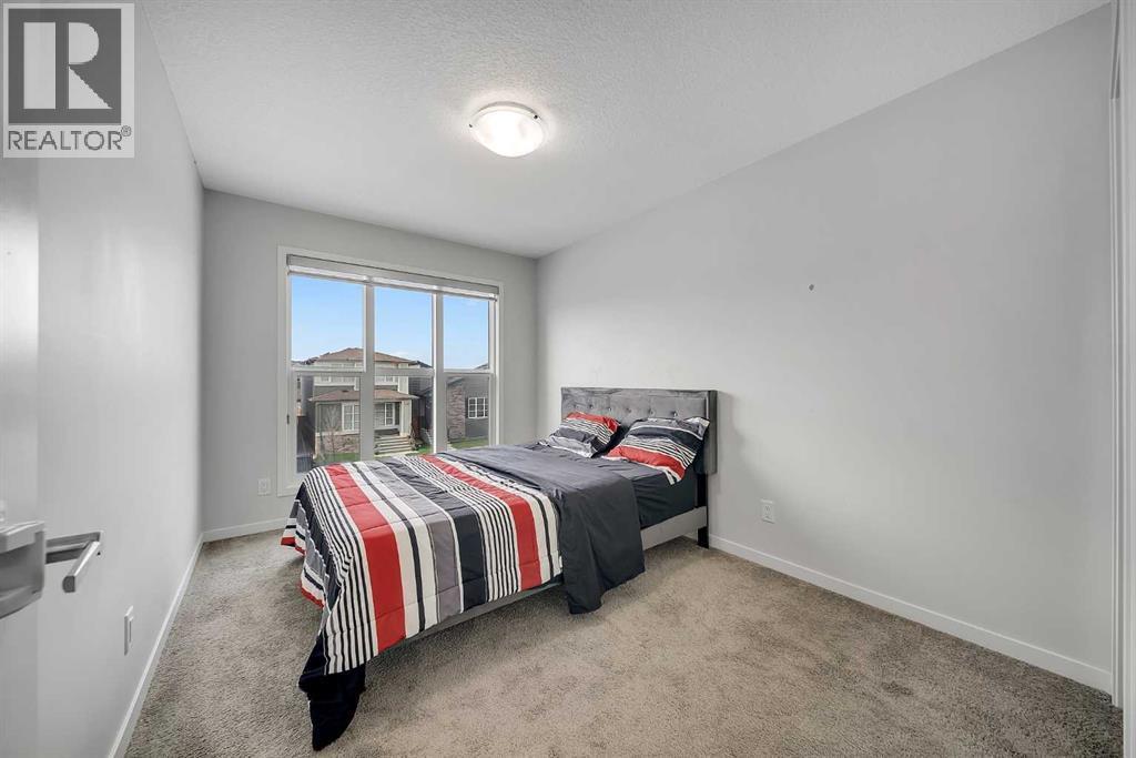 132 Howse Crescent Ne, Calgary, AB - Indoor Photo Showing Bedroom