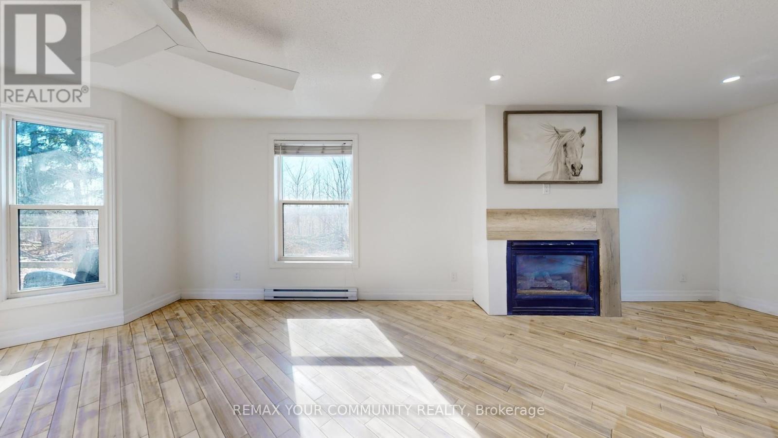 4219 Stouffville Road, Whitchurch-Stouffville, ON - Indoor With Fireplace