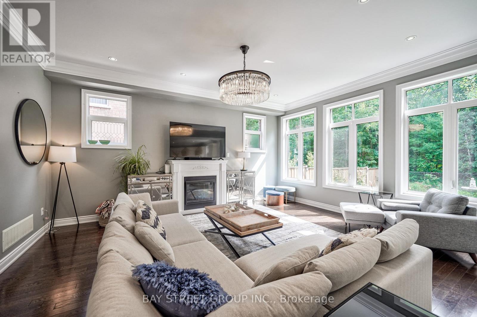 23 Trail Boulevard, Springwater, ON - Indoor Photo Showing Living Room With Fireplace
