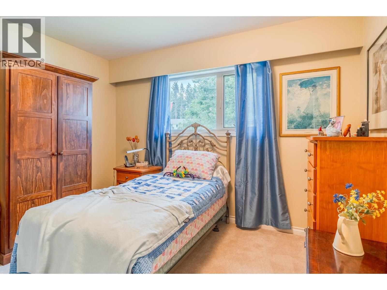 4882 Gloinnzun Crescent, 108 Mile Ranch, BC - Indoor Photo Showing Bedroom