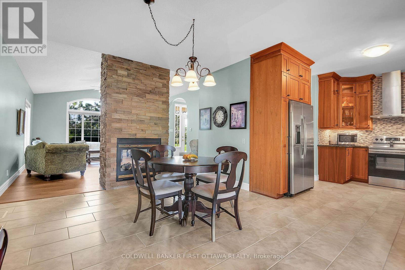 6983 Lakes Park Drive, Ottawa, ON - Indoor With Fireplace