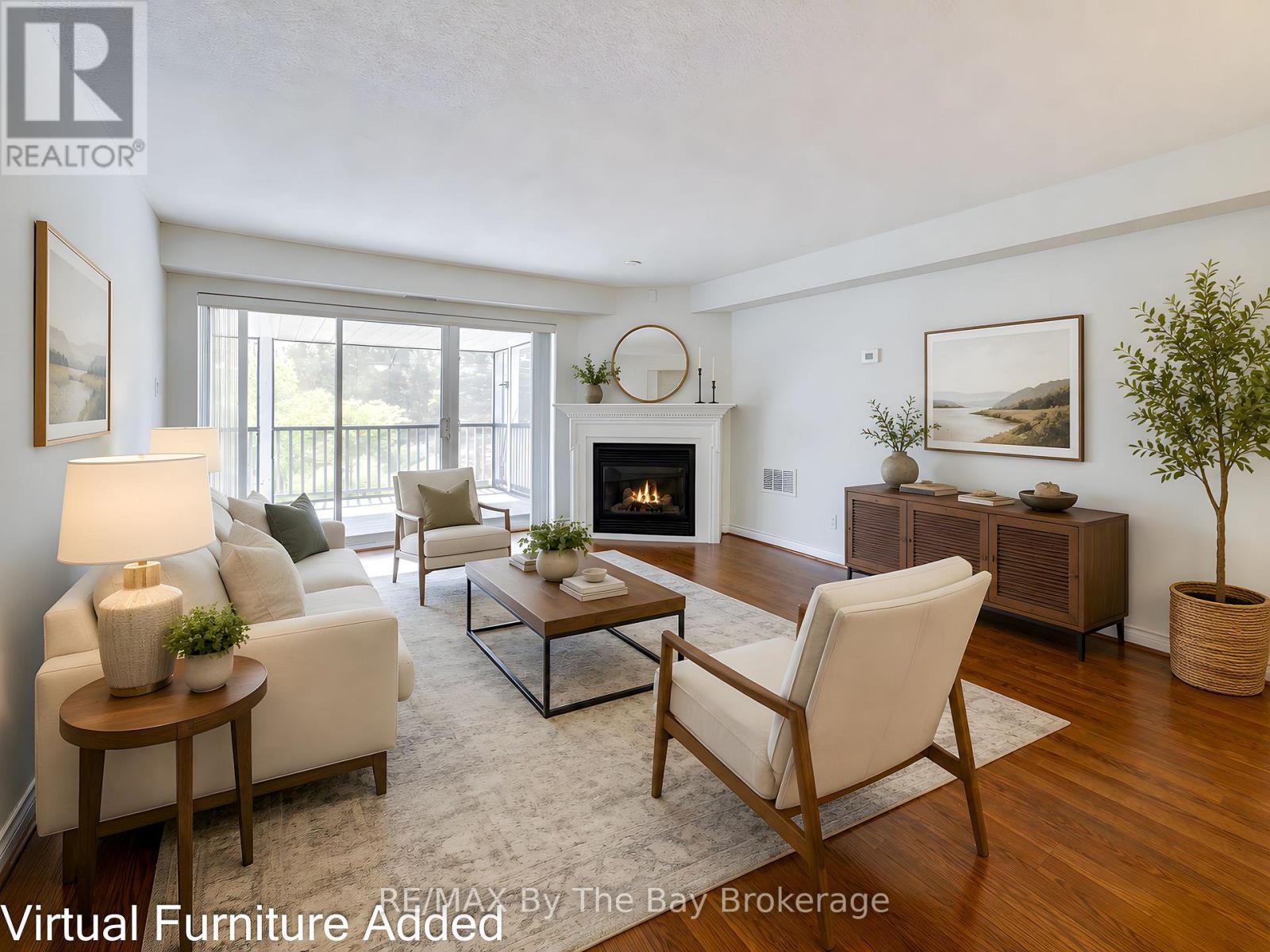 8 - 30 Mulligan Lane, Wasaga Beach, ON - Indoor Photo Showing Living Room With Fireplace