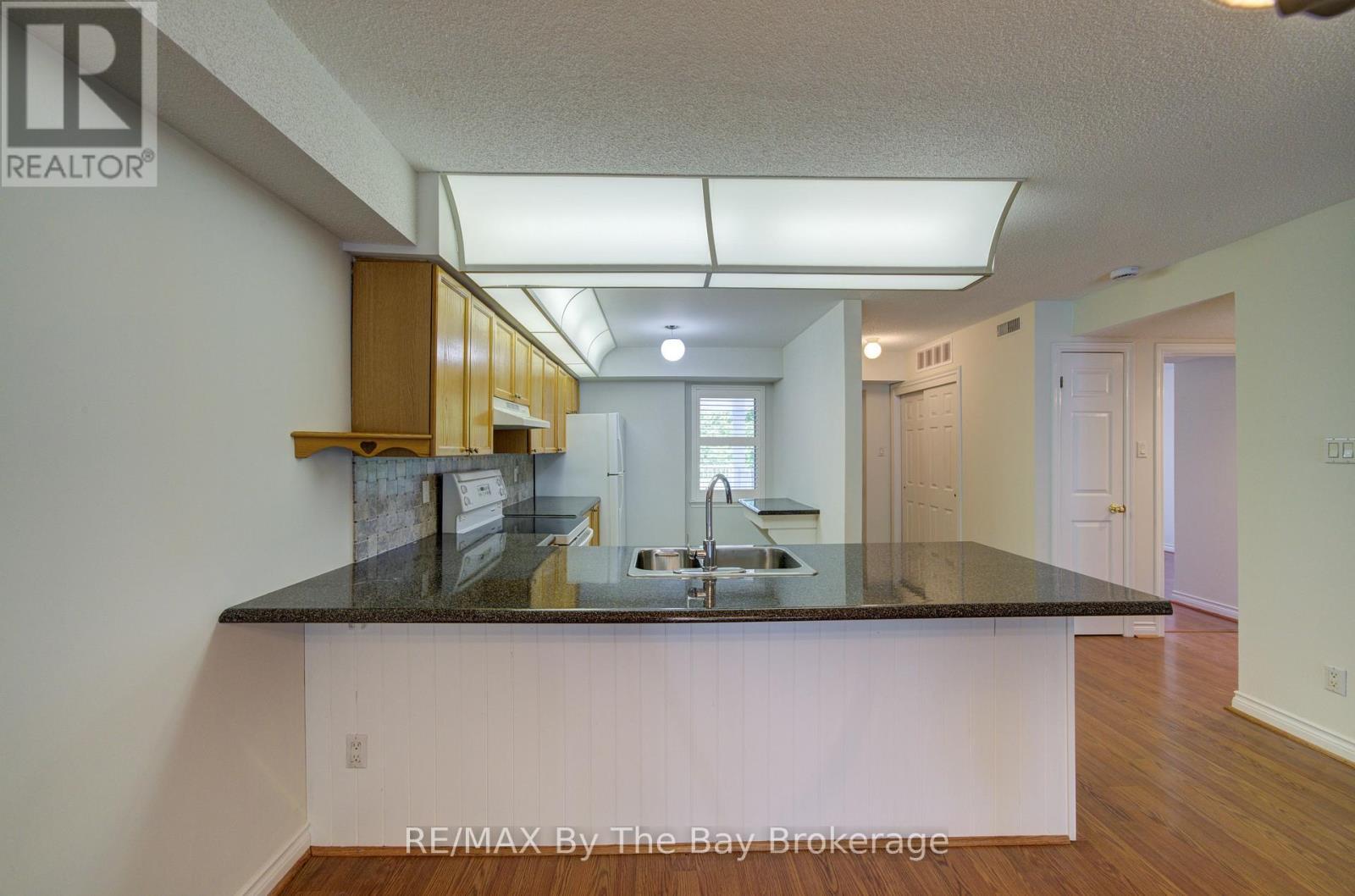 8 - 30 Mulligan Lane, Wasaga Beach, ON - Indoor Photo Showing Kitchen With Double Sink