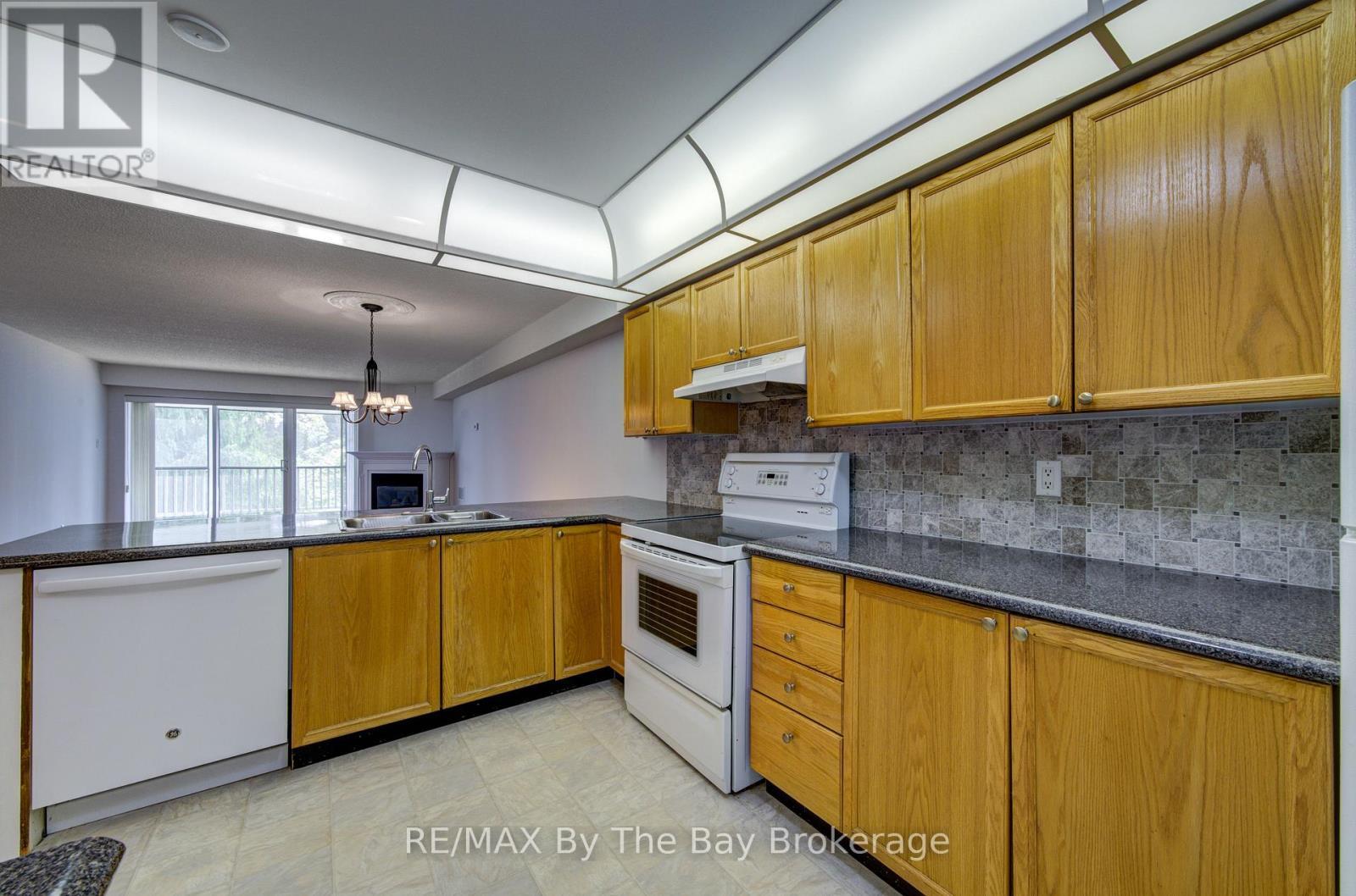 8 - 30 Mulligan Lane, Wasaga Beach, ON - Indoor Photo Showing Kitchen With Double Sink