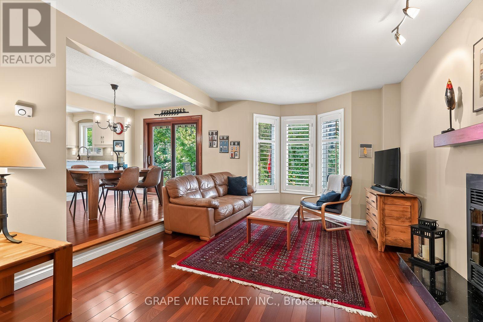 36 Baslaw Drive, Ottawa, ON - Indoor Photo Showing Living Room With Fireplace