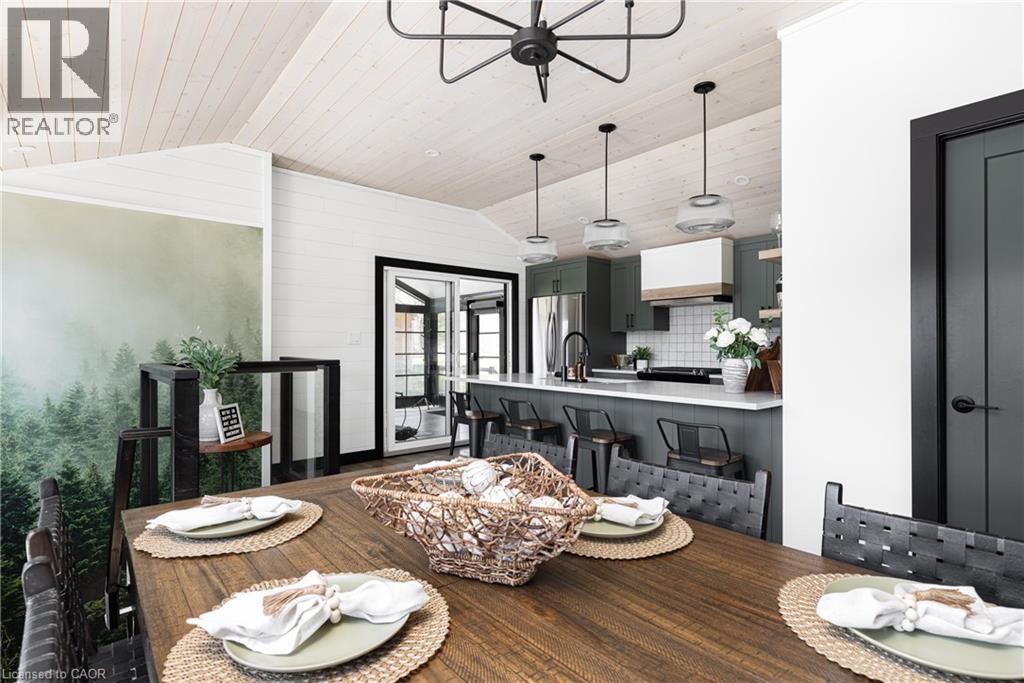 Dining Room with Kitchen View - 1558 Fish Hatchery Road Unit# 10, Muskoka Lakes, ON - Indoor Photo Showing Dining Room