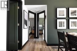 Hallway to bathrooms off kitchen/dining area -