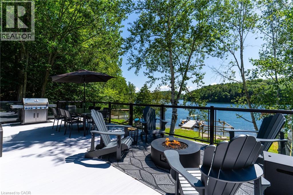 Upper Patio with lake views - 1558 Fish Hatchery Road Unit# 10, Muskoka Lakes, ON - Outdoor With Body Of Water