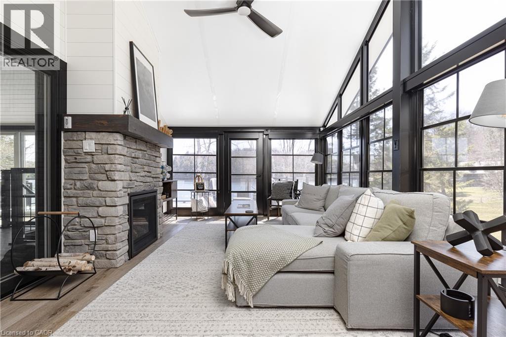 Muskoka Room - 1558 Fish Hatchery Road Unit# 10, Muskoka Lakes, ON - Indoor With Fireplace
