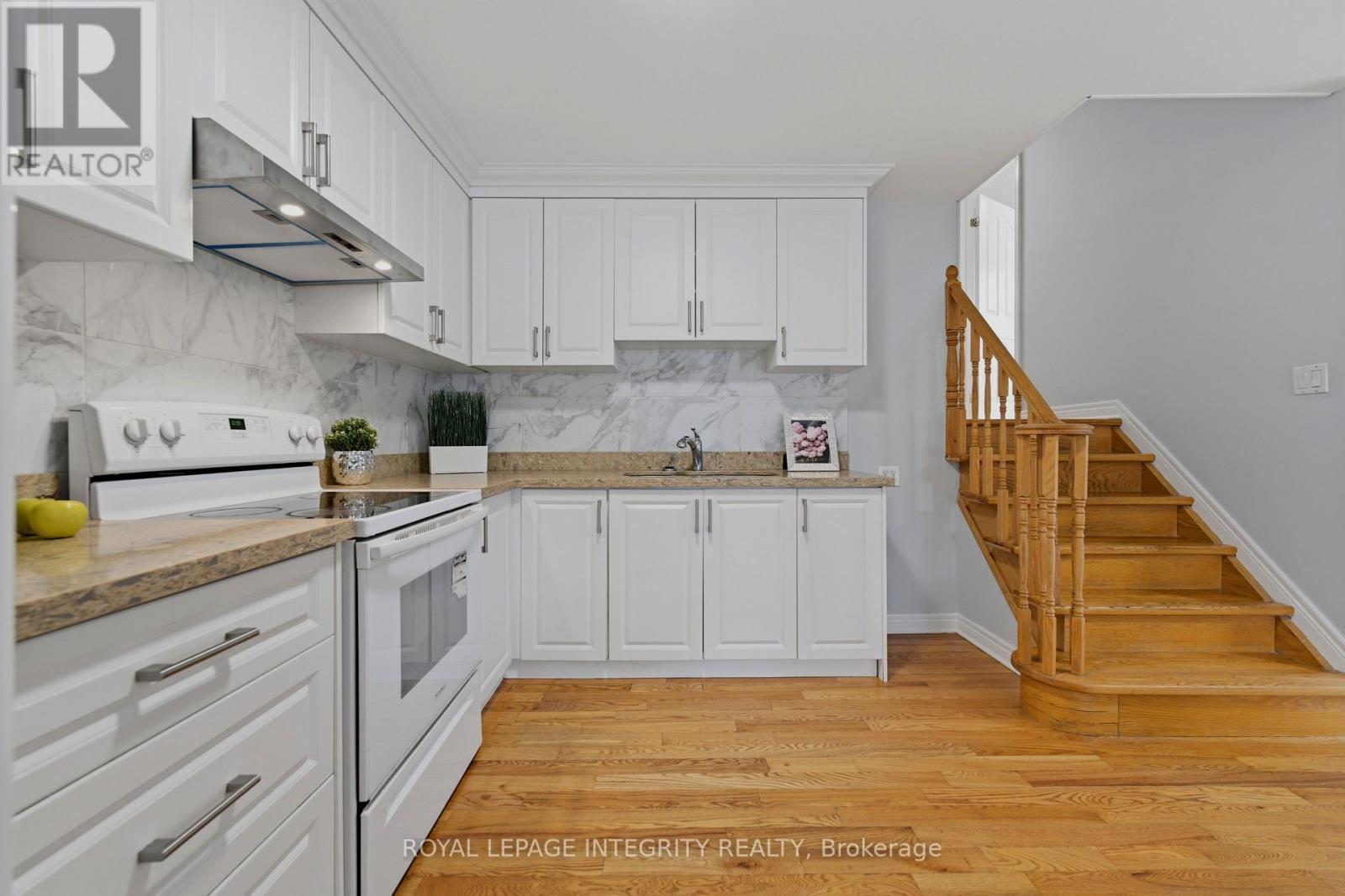 Kitchen + Stairs - Main Floor - 1625 Baseline Road, Ottawa, ON - Indoor Photo Showing Kitchen