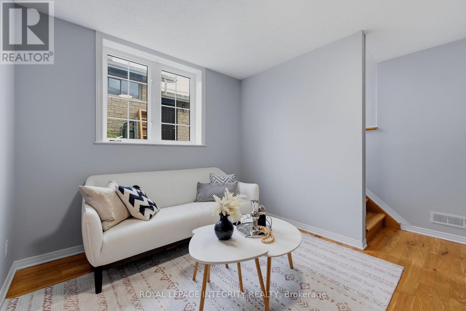 Living Room W/ bright window - Lower Level - 1625 Baseline Road, Ottawa, ON - Indoor Photo Showing Living Room