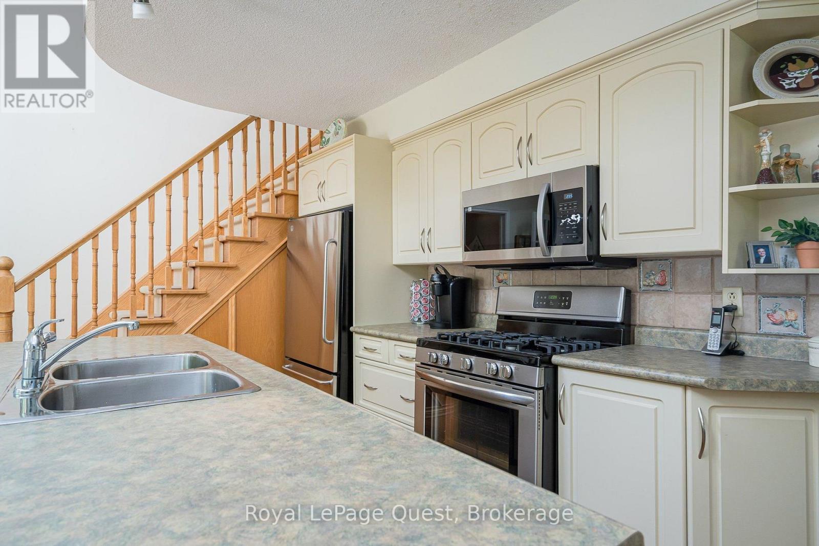 490 Silver Birch Drive, Tiny, ON - Indoor Photo Showing Kitchen With Double Sink