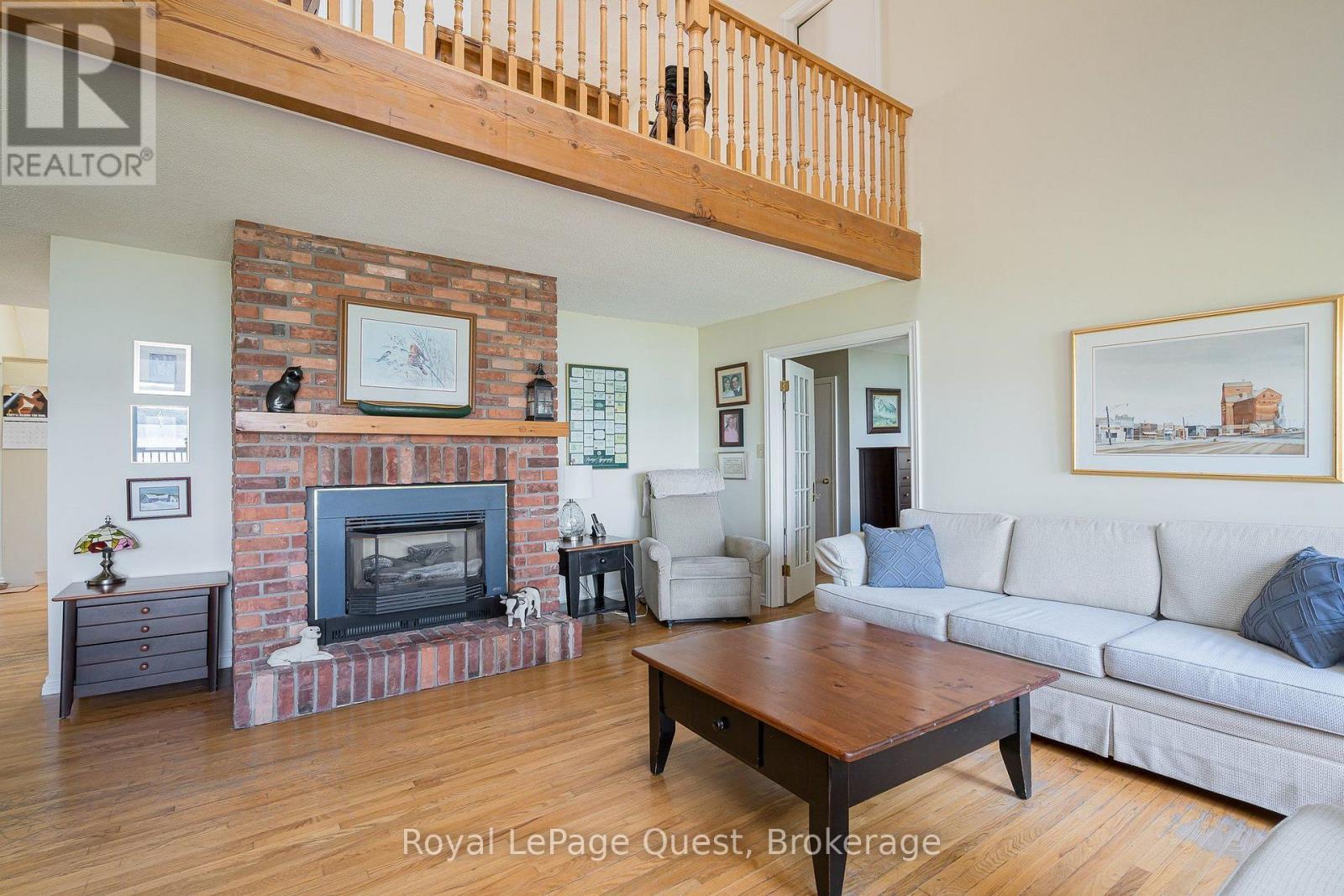 490 Silver Birch Drive, Tiny, ON - Indoor Photo Showing Living Room With Fireplace