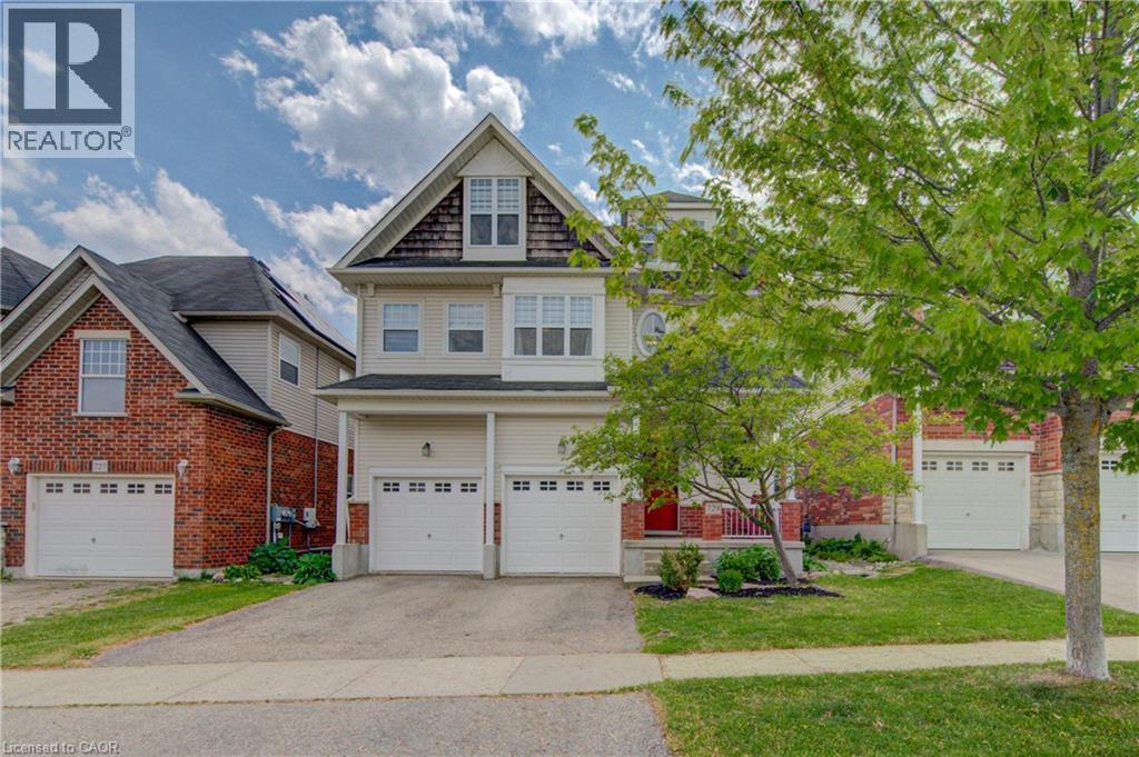 Two-story residence featuring light-toned siding and brick accents - 729 Keats Way, Waterloo, ON - Outdoor With Facade