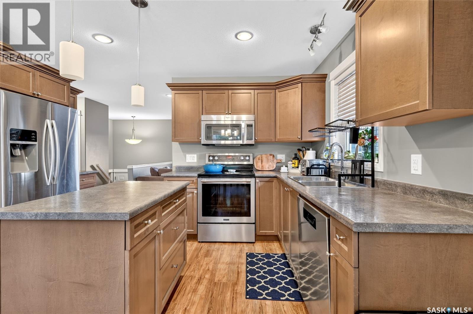 416 Loeppky Avenue, Dalmeny, SK - Indoor Photo Showing Kitchen With Double Sink With Upgraded Kitchen