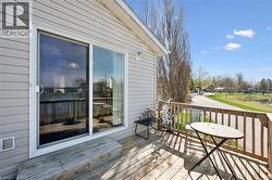 Exterior deck featuring wood flooring and a perimeter railing -