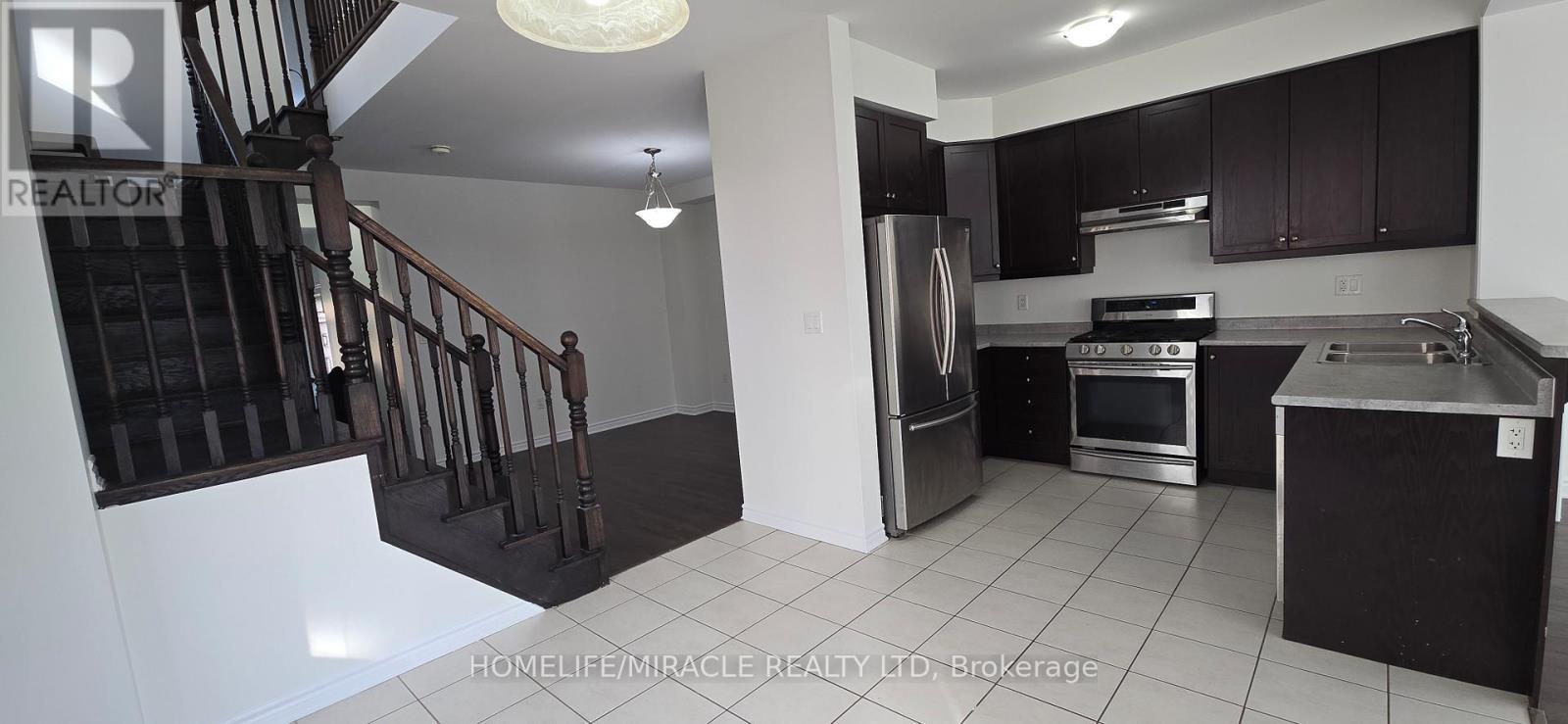 25 Phyllis Drive, Caledon, ON - Indoor Photo Showing Kitchen With Stainless Steel Kitchen With Double Sink