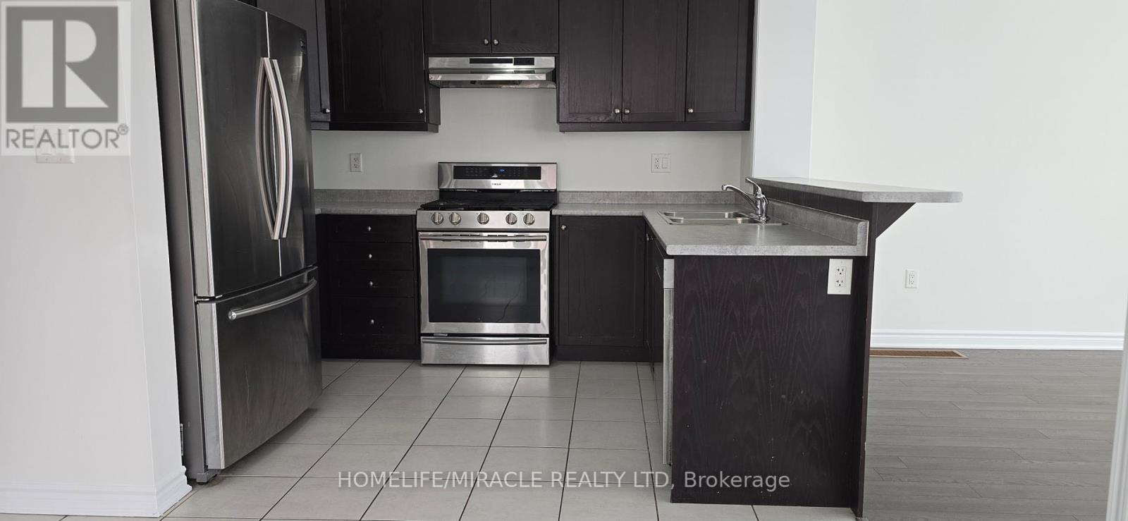 25 Phyllis Drive, Caledon, ON - Indoor Photo Showing Kitchen With Stainless Steel Kitchen With Double Sink