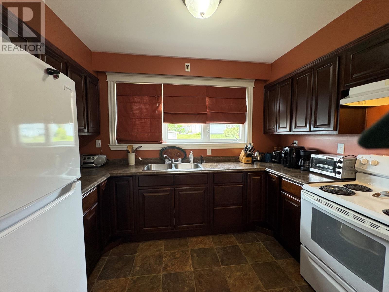 23 Georgia Loop, Stephenville, NL - Indoor Photo Showing Kitchen With Double Sink