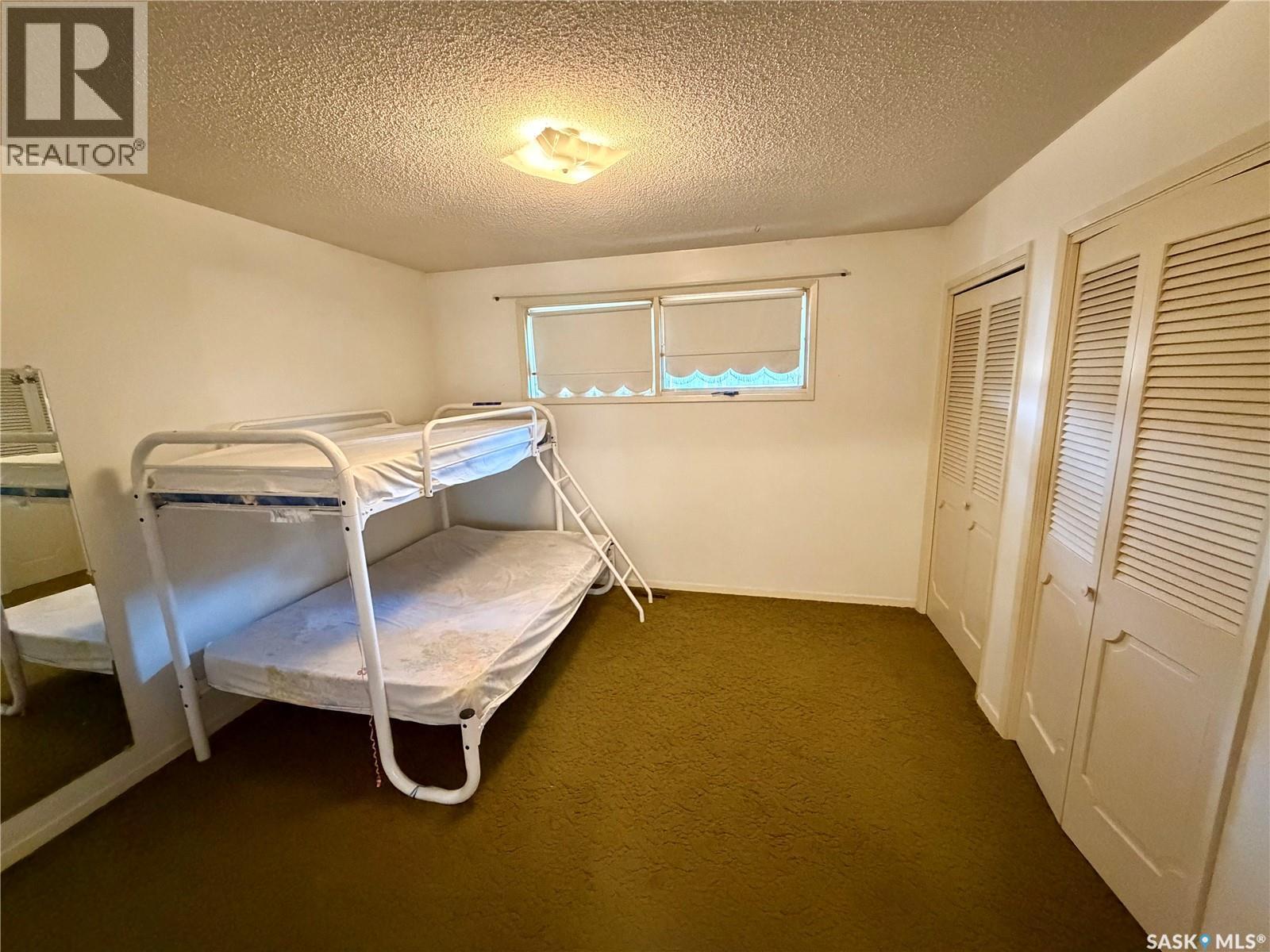1247 Gordon Road, Moose Jaw, SK - Indoor Photo Showing Bedroom