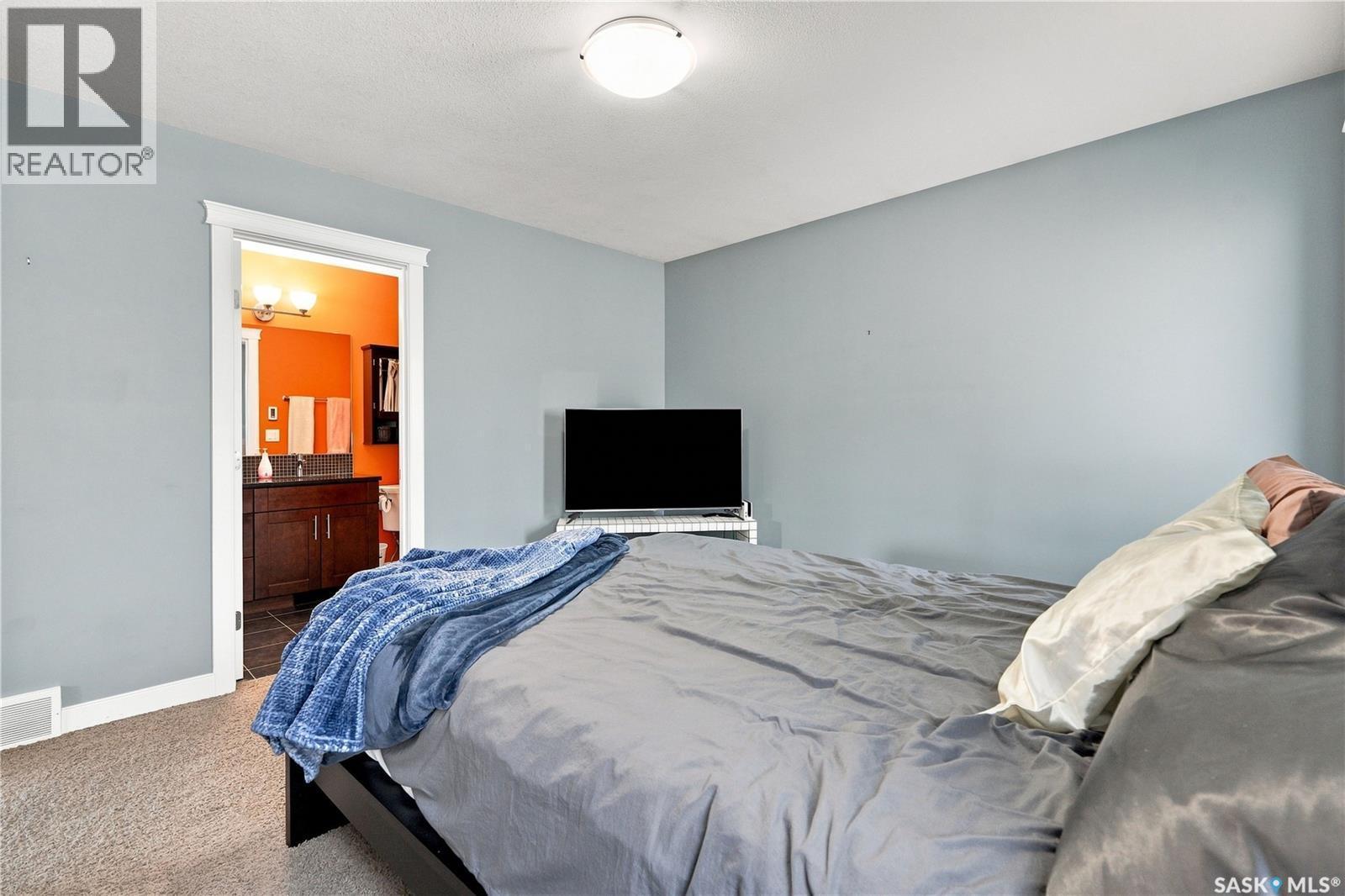 635 Redwood Crescent, Warman, SK - Indoor Photo Showing Bedroom