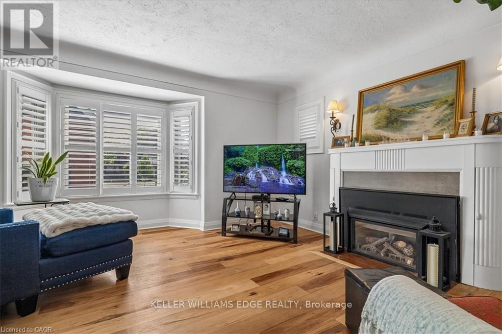 573 Beach Boulevard, Hamilton, ON - Indoor Photo Showing Living Room With Fireplace