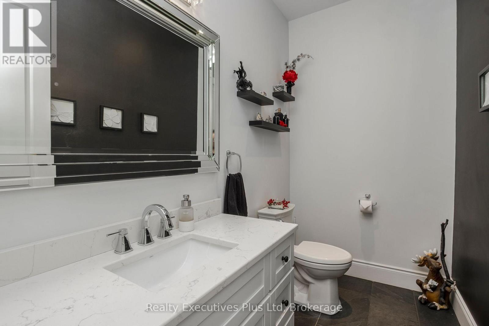 Main Level 2 PC Powder Room next to Mudroom - 27 Kingfisher Crescent, Tiny, ON - Indoor Photo Showing Bathroom