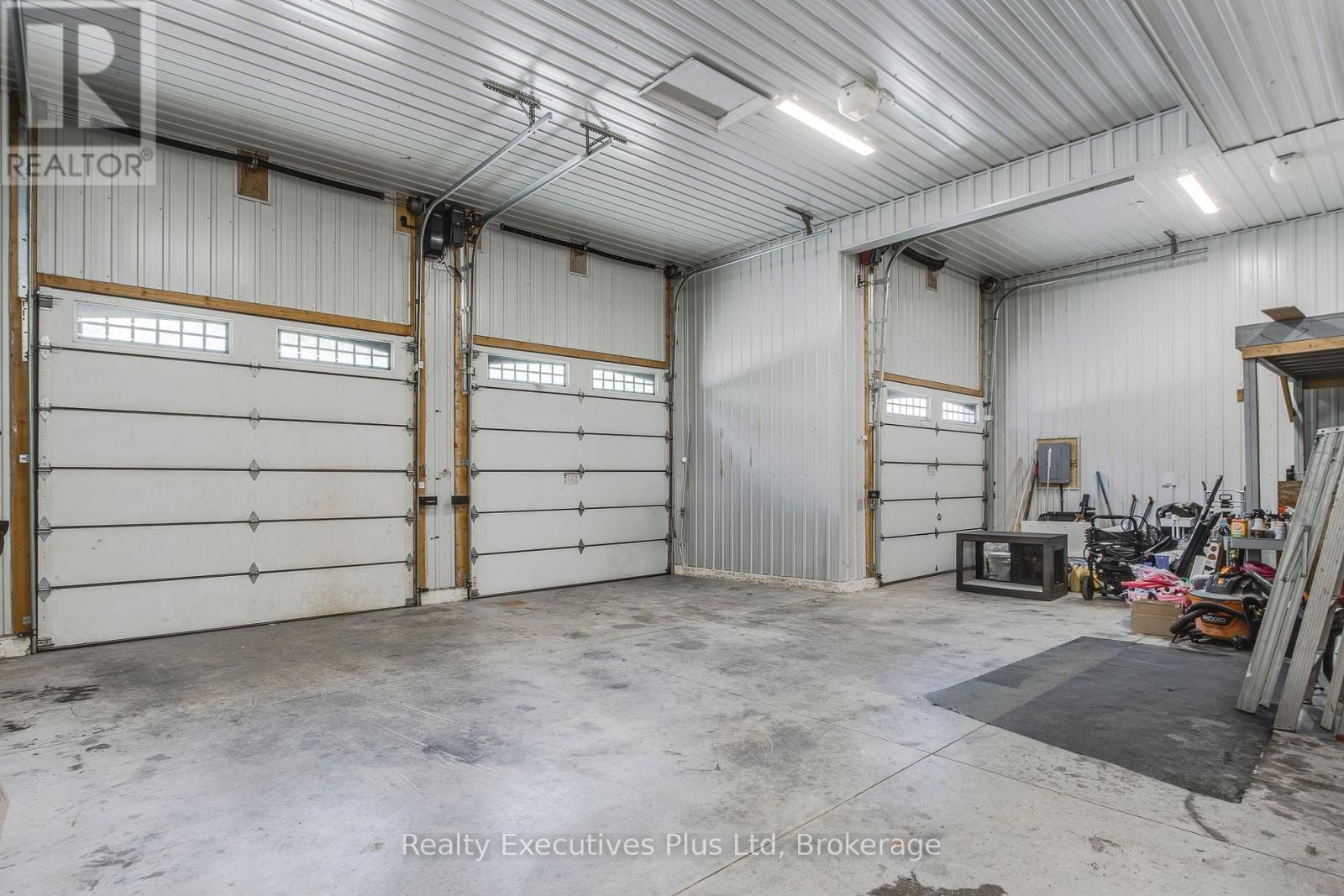 Garage Area - 27 Kingfisher Crescent, Tiny, ON - Indoor Photo Showing Garage
