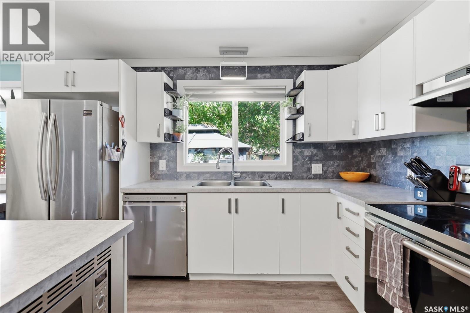 2508 Preston Avenue S, Saskatoon, SK - Indoor Photo Showing Kitchen With Stainless Steel Kitchen With Double Sink
