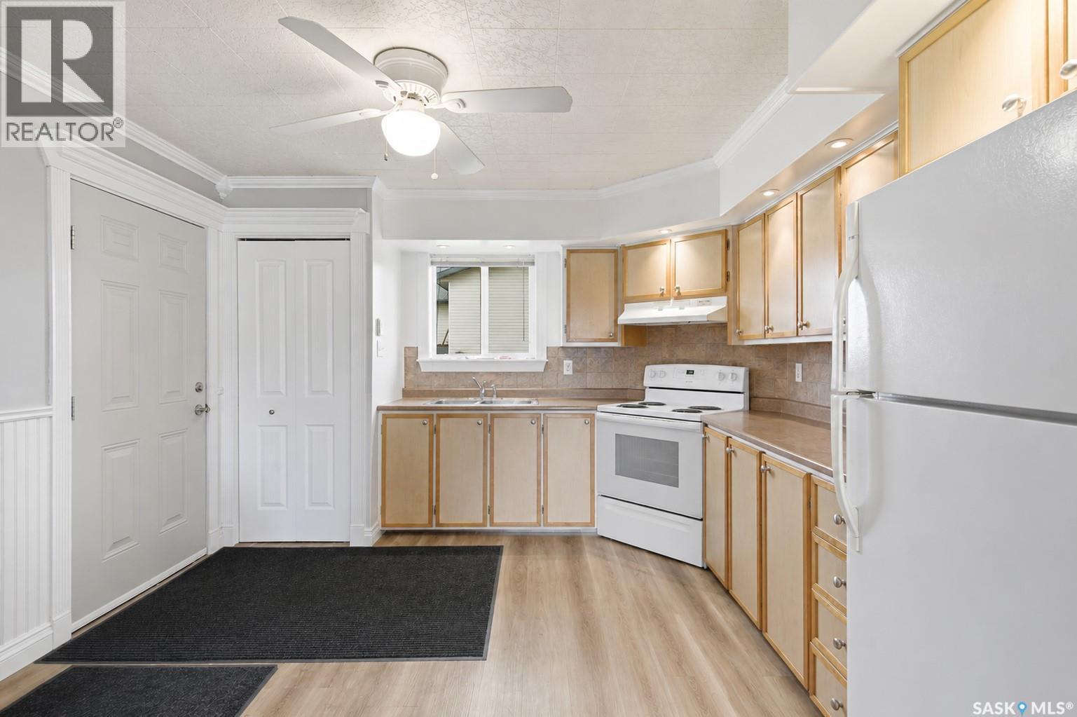 157 4Th Street W, Pierceland, SK - Indoor Photo Showing Kitchen With Double Sink