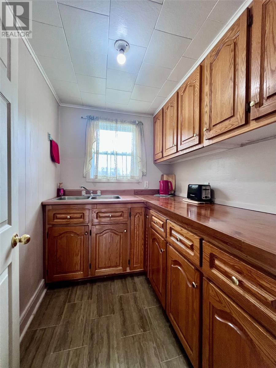 35 Eldon Street, Fortune, NL - Indoor Photo Showing Kitchen With Double Sink