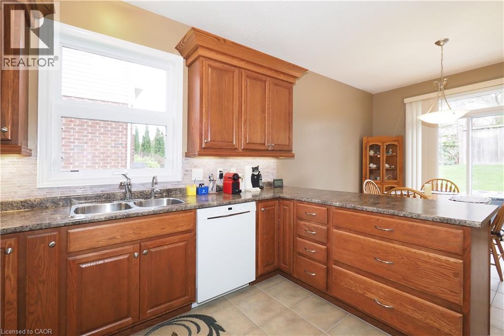 565 Springwater Drive, Waterloo, ON - Indoor Photo Showing Kitchen With Double Sink