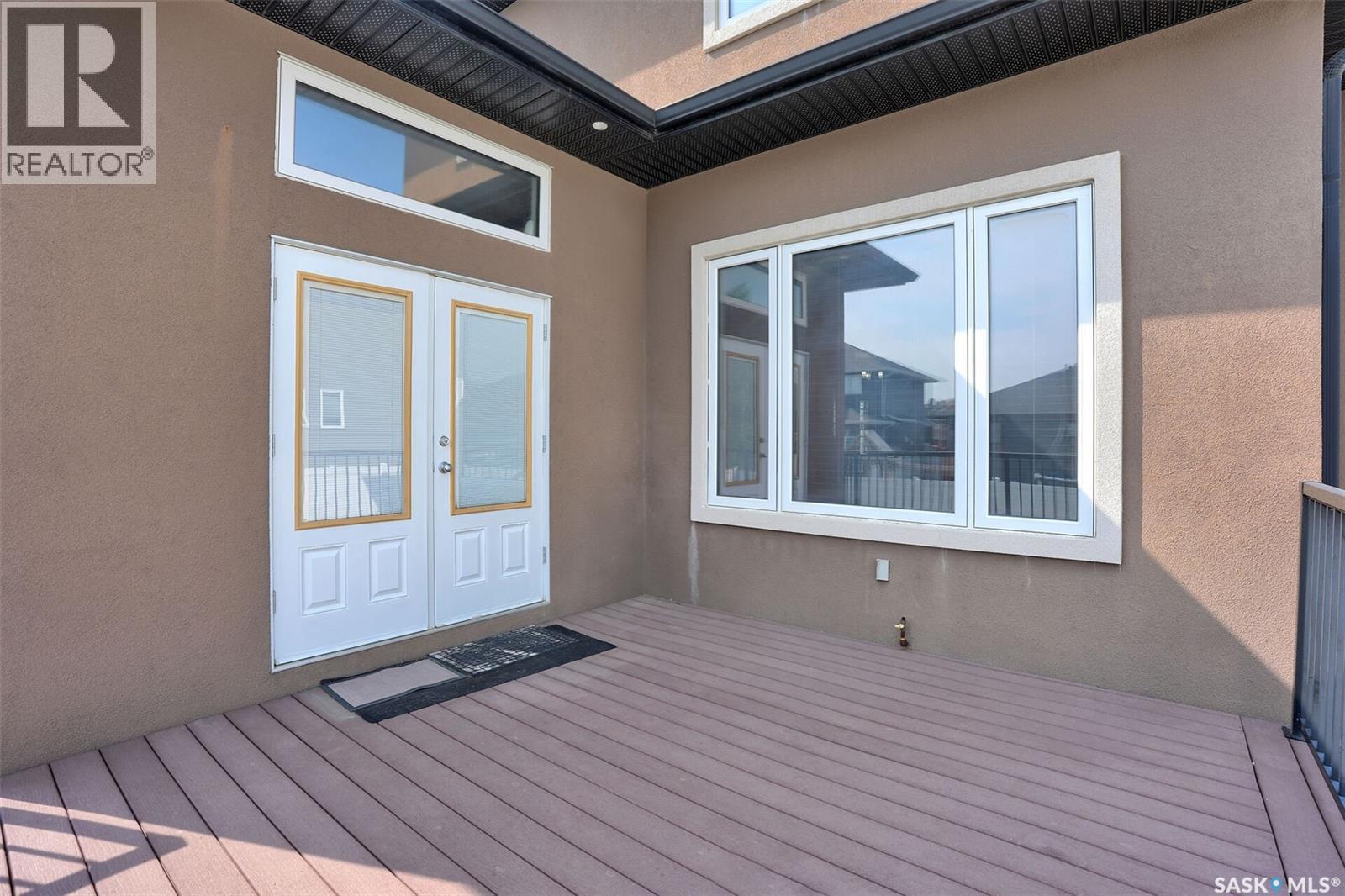 6033 Little Pine Loop, Regina, SK - Outdoor With Deck Patio Veranda With Exterior