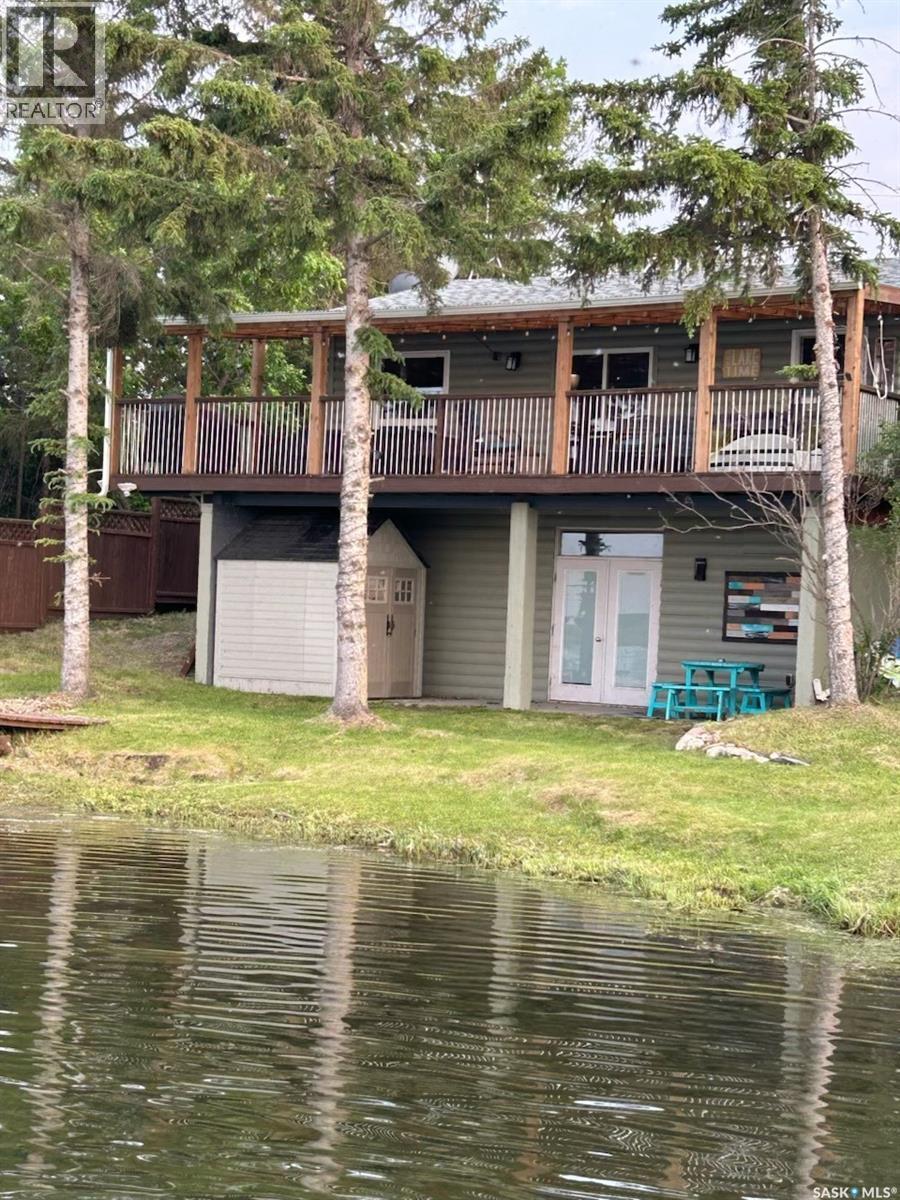 3829 First Point Beach Drive, Wakaw Lake, SK - Outdoor With Body Of Water With Deck Patio Veranda