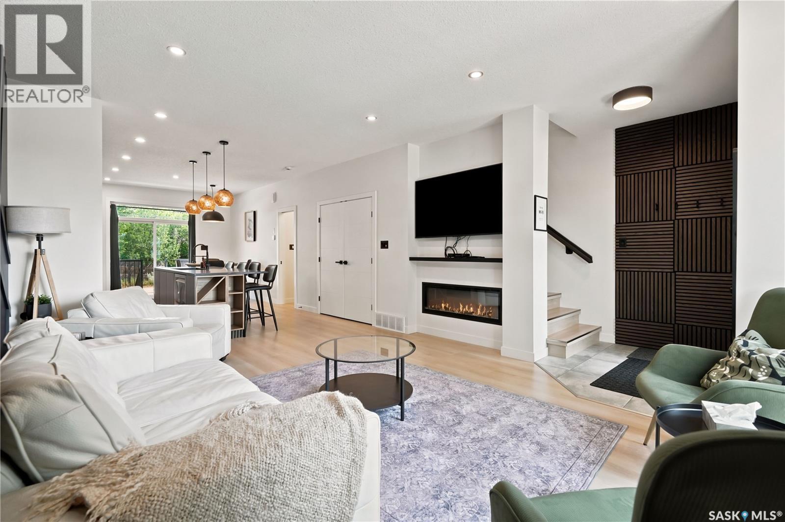 2023 Edward Street, Regina, SK - Indoor Photo Showing Living Room With Fireplace