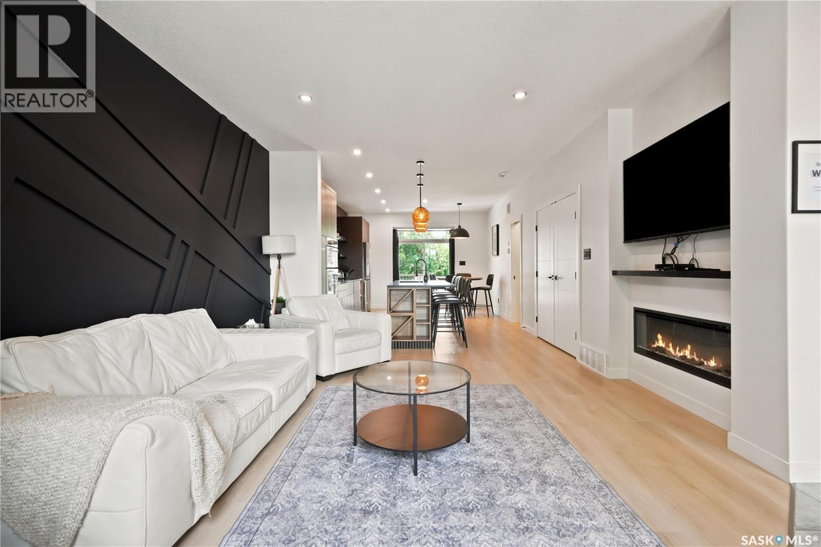 2023 Edward Street, Regina, SK - Indoor Photo Showing Living Room With Fireplace