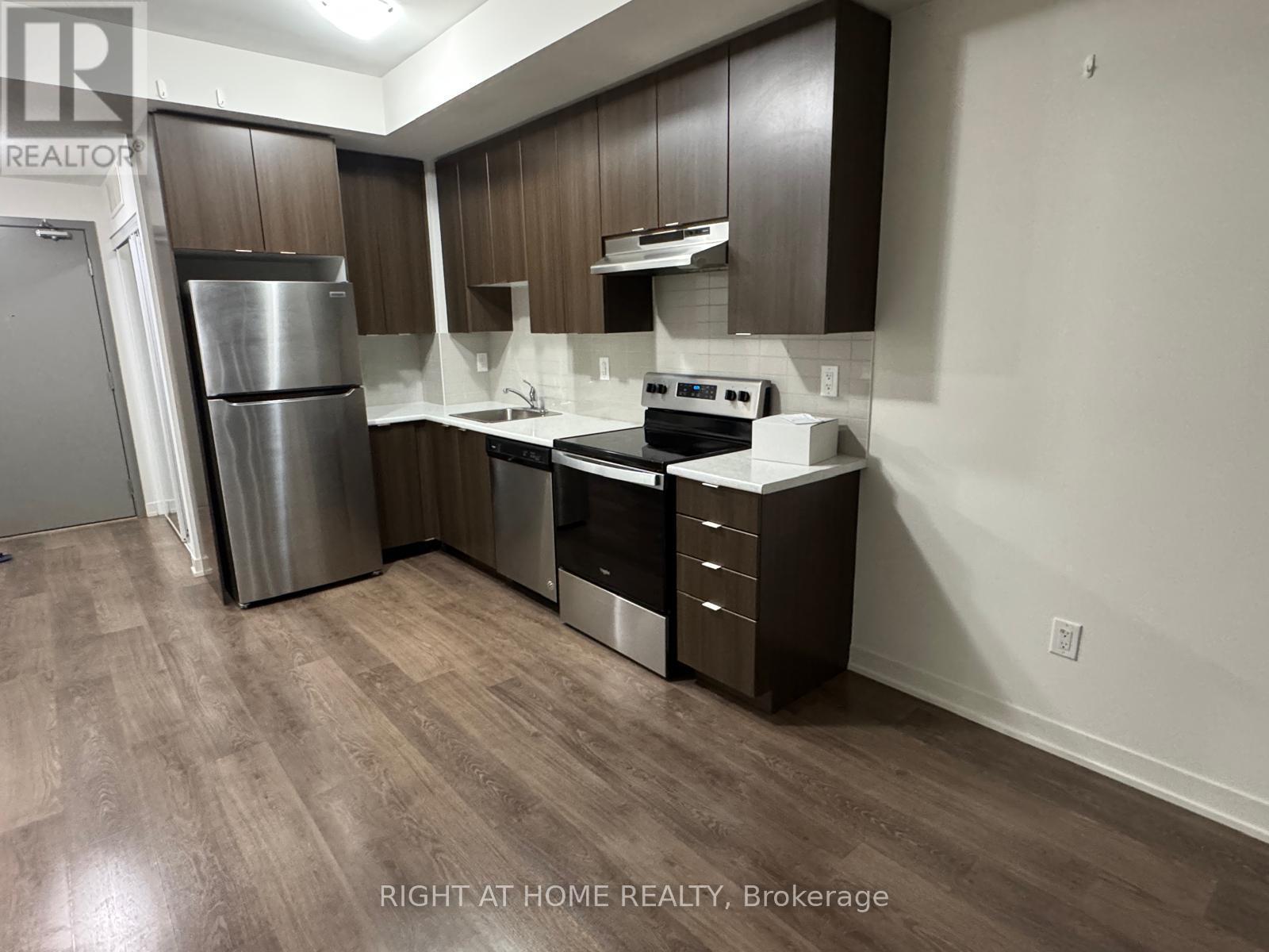 401 - 5131 Sheppard Avenue E, Toronto, ON - Indoor Photo Showing Kitchen With Stainless Steel Kitchen