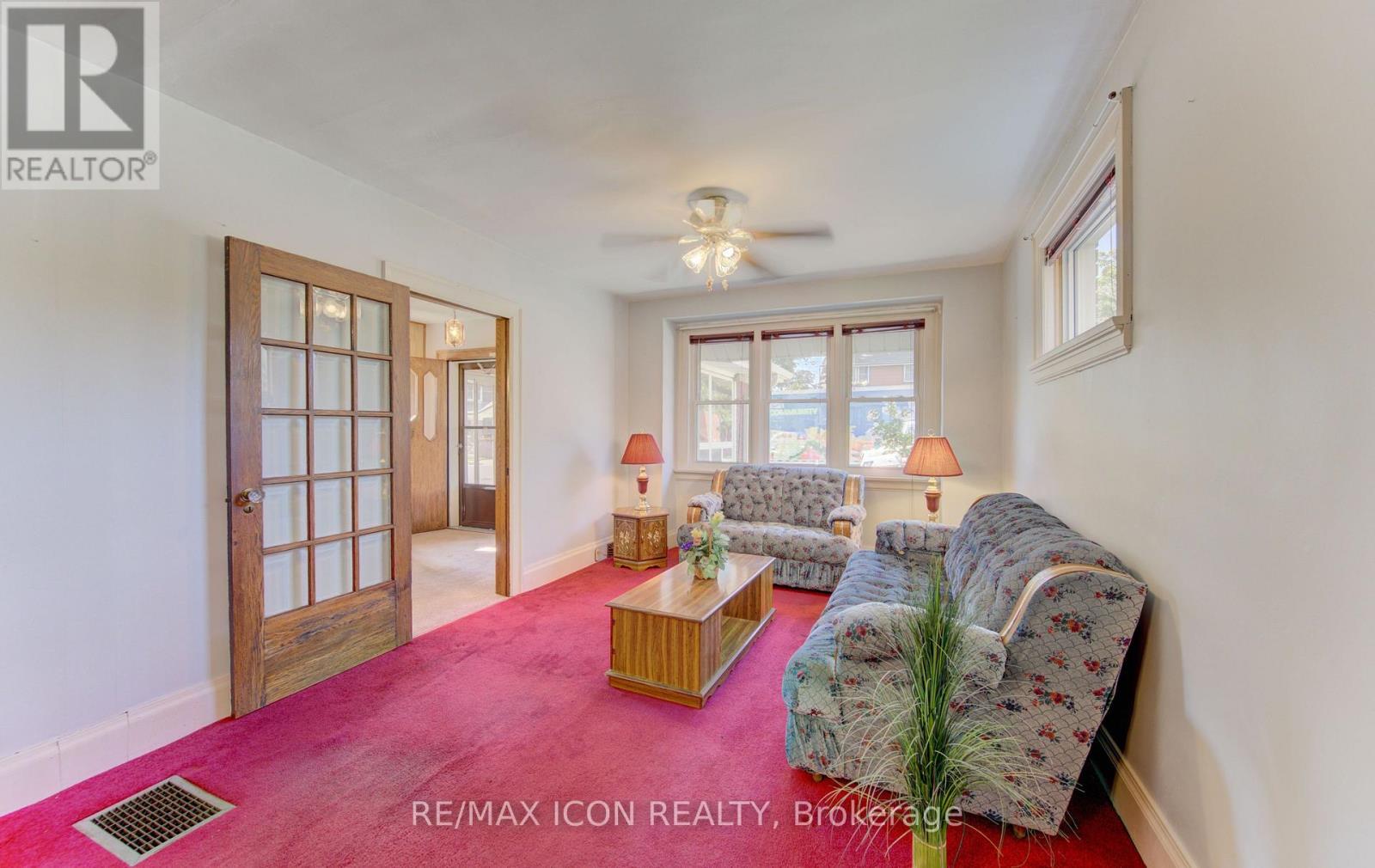 Livingroom with wooden french doors - 224 Weber Street E, Kitchener, ON - Indoor Photo Showing Other Room