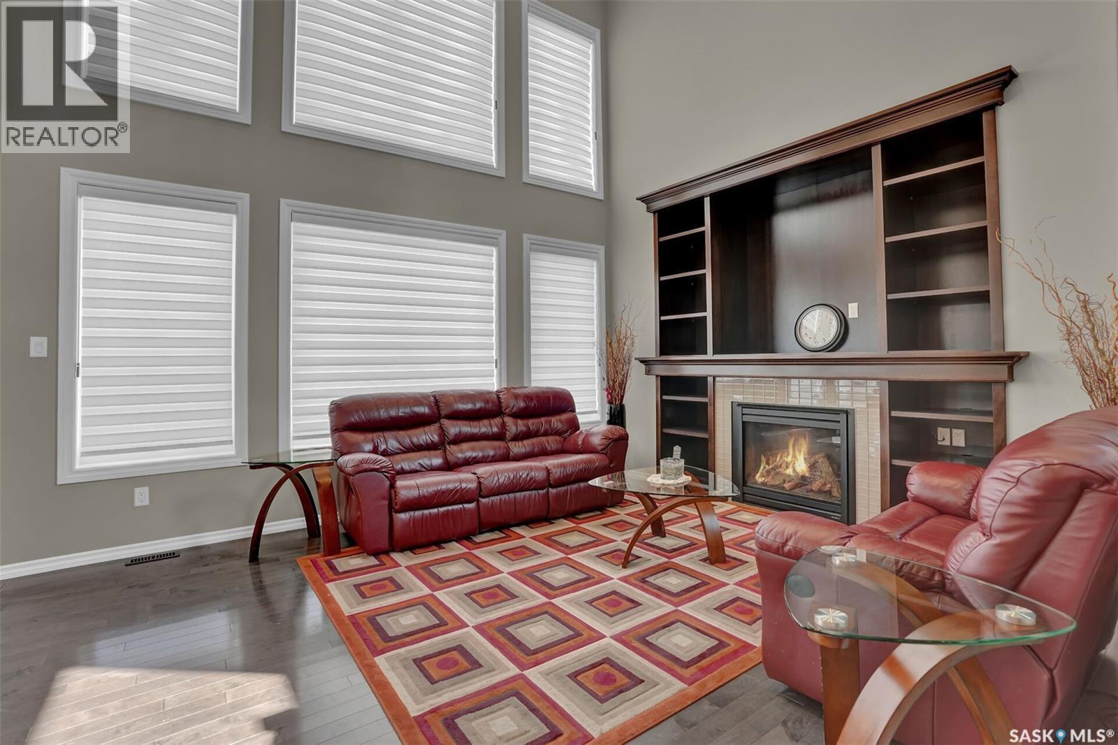 3826 Goldfinch Way, Regina, SK - Indoor Photo Showing Living Room With Fireplace