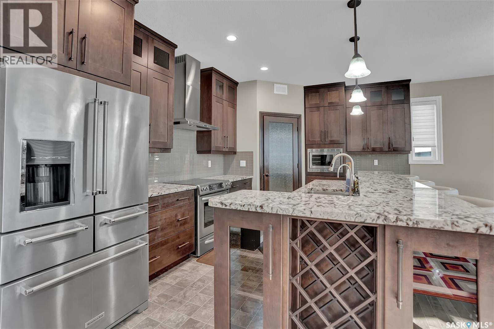 3826 Goldfinch Way, Regina, SK - Indoor Photo Showing Kitchen With Stainless Steel Kitchen With Upgraded Kitchen