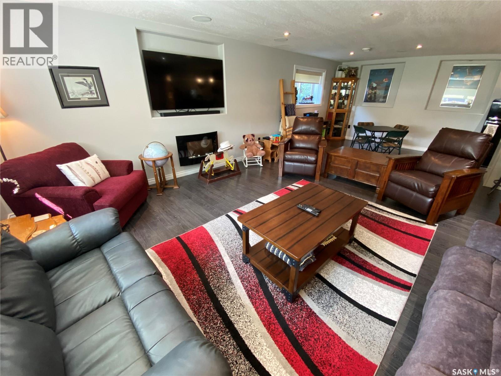 74 Madge Way, Yorkton, SK - Indoor Photo Showing Living Room With Fireplace
