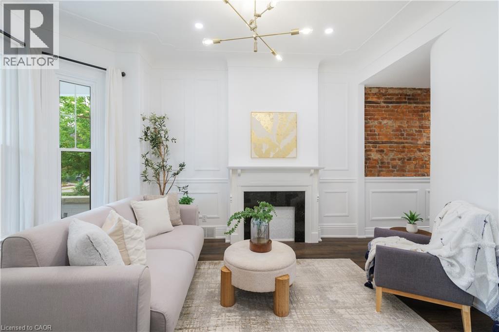 46 Murray Street E, Hamilton, ON - Indoor Photo Showing Living Room With Fireplace