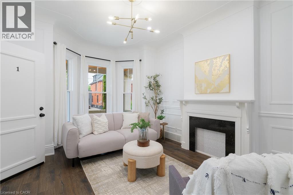 46 Murray Street E, Hamilton, ON - Indoor Photo Showing Living Room With Fireplace
