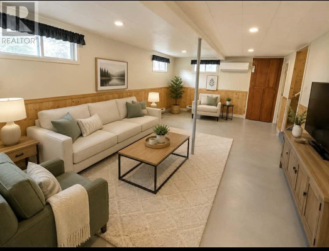 Staged with AI - 4 Second Avenue, Bishop'S Falls, NL - Indoor Photo Showing Living Room