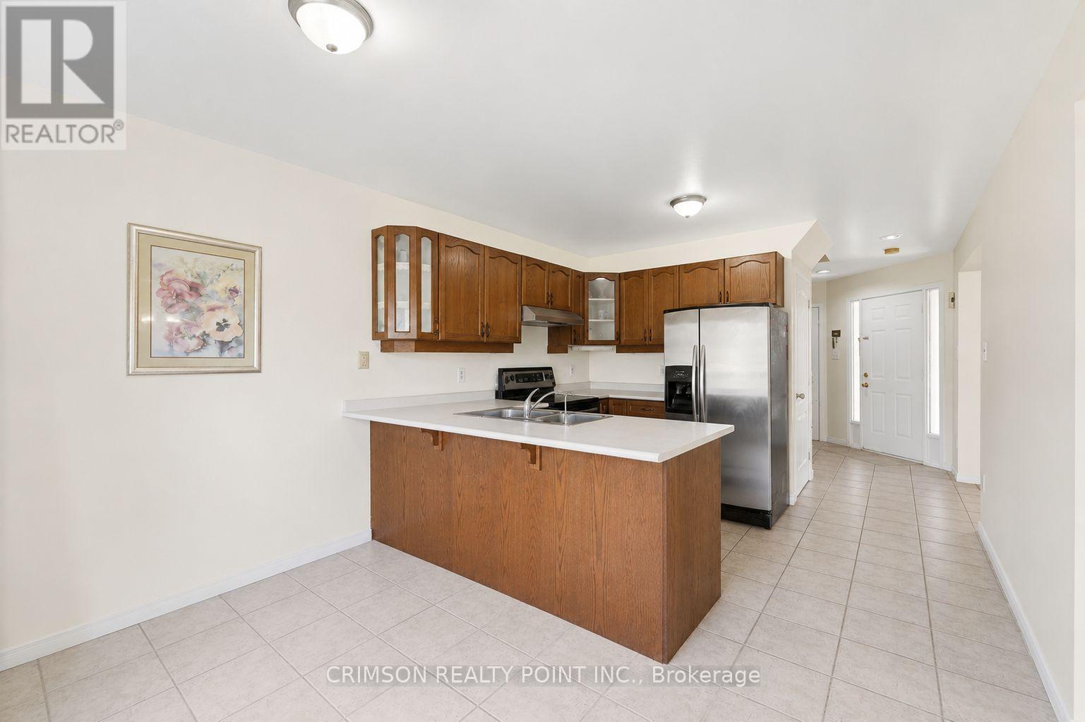 1406 Upper Sherman Avenue, Hamilton, ON - Indoor Photo Showing Kitchen With Double Sink