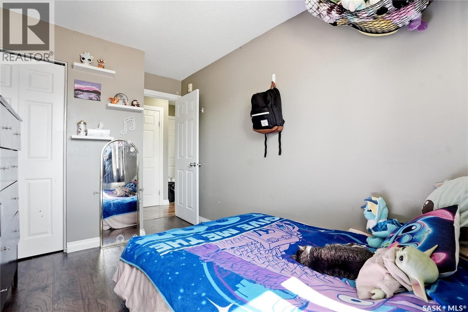 7 115 Acadia Drive, Saskatoon, SK - Indoor Photo Showing Bedroom